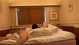 Voluptuous Japanese President Undresses Revealing Her Arousal